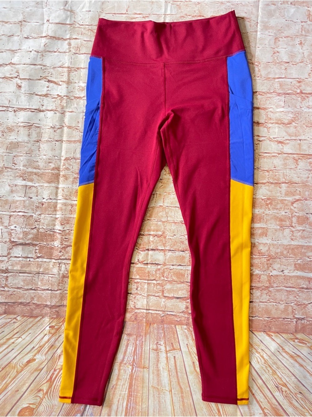 Fabletics PowerHold (Superman) Colorblock Red Leggings with Blue & Yellow Panels